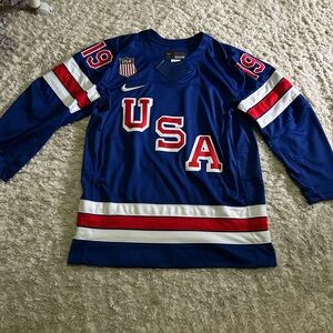 USA Men’s Milano Winter Olympics Home Jersey (#19 Matthew Tkachuk)